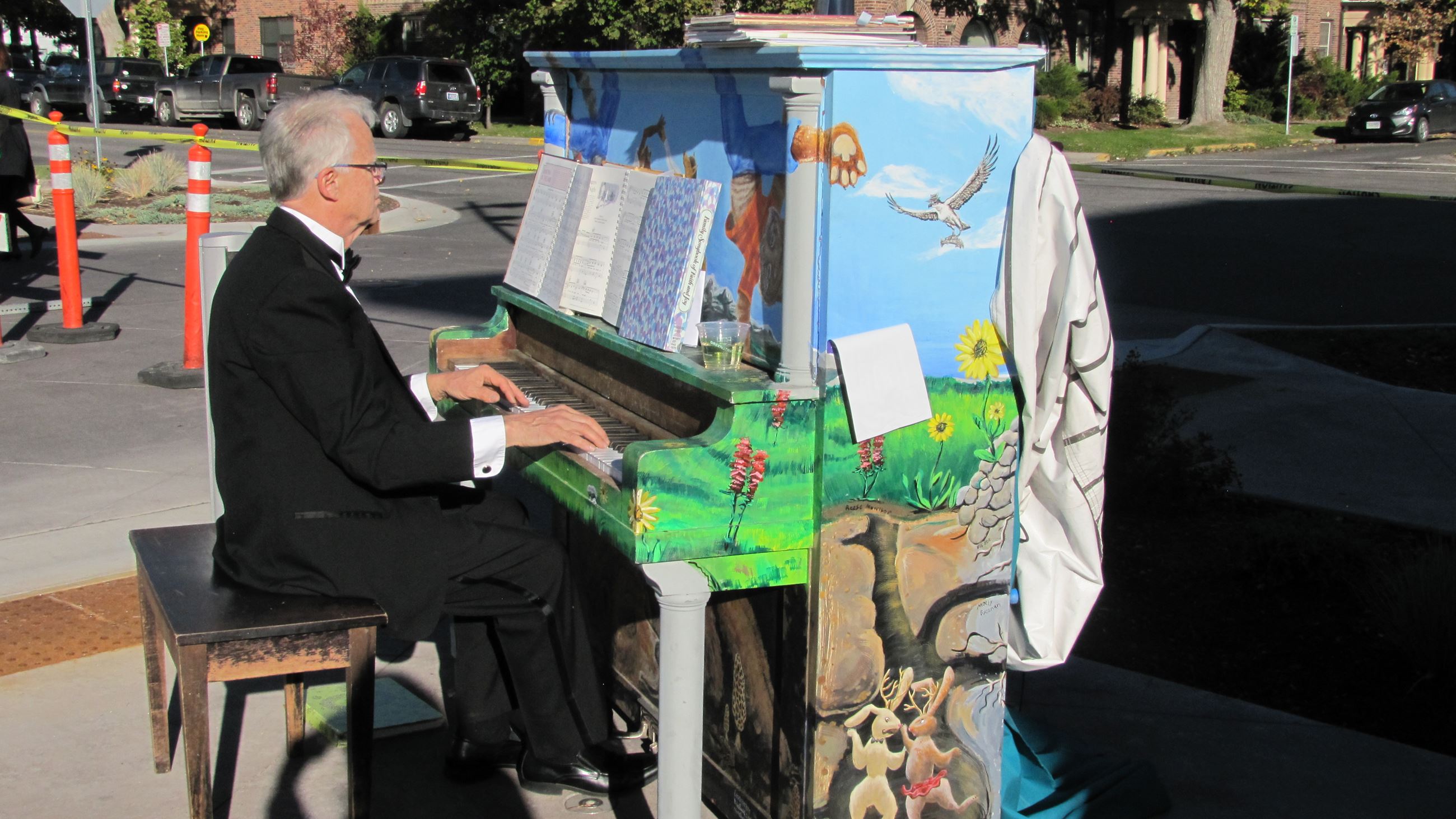 Pianist playing a Play it Missoula piano